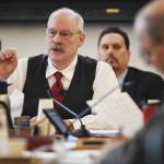 Co-Chair Sen. Bert Stedman, listens to Donna Arduin, Director of the Office of Budget and Management, and Lacey Sanders, Budget Director for OMB, as they present Gov. Mike Dunleavys state budget in front of the Senate Finance Committee at the Capitol on Thursday, Feb. 14, 2019. (Michael Penn | Juneau Empire)