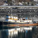 The derelict tug, the Lumberman, at anchor in Gastineau Channel on Tuesday, Feb. 26, 2019. (Michael Penn | Juneau Empire)