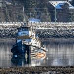 The derelict tug, the Lumberman, at anchor in Gastineau Channel on Tuesday, Feb. 26, 2019. (Michael Penn | Juneau Empire)