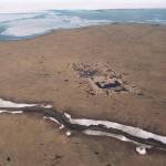 An aerial shows the footprint of the test well drilled in the mid-1980s on land owned by the Kaktovik Native village corporation within the 1002 area of the Arctic National Wildlife Refuge. The well is 14 miles east of Kaktovik and the melting the Beaufort Sea is at the top of the picture. (Michael Penn | Juneau Empire File)