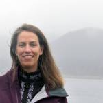 Amy Gulick smiles outside on a gray May day in Juneau, Thursday, May 2, 2019. (Ben Hohenstatt | Capital City Weekly)