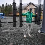 Charlie Herrington, Marketing Manager for the Eaglecrest Ski Area, shows off new radio-frequency identification gates on Tuesday, Oct. 29, 2019, that skiers will use this season to access the chairlifts. (Michael Penn | Juneau Empire)