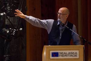Thomas Thornton, dean of Arts and Science at University of Alaska Southeast, gives a lecture about the state and nontangible benefits of Alaskas herring egg trade at the Sealaska Heritage Institute, Nov. 26, 2019. (Michael S. Lockett | Juneau Empire)