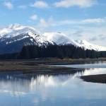 The west and middle peaks of Mount Juneau and Mount Roberts reflect on Mendenhall River on Sunday, March 22, 2020. (Courtesy Photo | Denise Carroll)