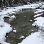 Right: A slough works its way through snow and ice along Windfall Lake trail on Feb. 26. (Courtesy Photo | Denise Carroll)
