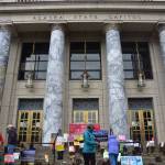 Environmental protestors with 350Juneau placed pairs of shoes on the steps of the Alaska State Capitol Wednesday, Aug. 12, 2020, to represent all the demonstrators who wouldve been there if not for the coronavirus pandemic. (Peter Segall / Juneau Empire)