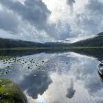Reflections in Windfall Lake of a brightening sky on Sept. 4, 2020. (Courtesy Photo / Denise Carroll)