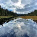 Sky is reflected in the water of Peterson Lake on Sept. 23, 2020. (Courtesy Photo / Denise Carroll)