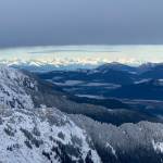 The Chilkat Mountains glow brightly in the distance as seen from the summit of Jumbo on Nov. 24. (Courtesy Photo / Robert Sauerteig)