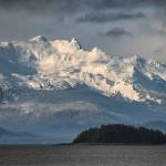 The Chilkat Mountains tower above William Henry Bay in this Friday, Feb. 26 photo. (Courtesy Photo / Kenneth Gill, gillfoto)