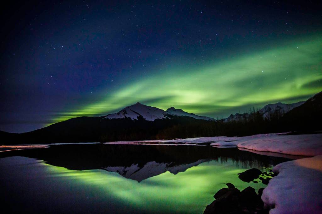 Aurora borealis can be seen over the Mendenhall River in this April 16 photo. (Courtesy Photo / Jack Beedle)
