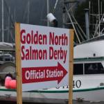 A sign points the way to the weigh station at the Mike Pusich Douglas Harbor during last years Golden North Salmon Derby on Aug. 16, 2020. This year is the derbys 75th year and organizers have added additional prizes in celebration of the event. (Peter Segall / Juneau Empire)
