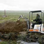A worker with the Pebble Mine project digs in the Bristol Bay region of Alaska near the village of Iliamma, Alaska. The U.S. Environmental Protection Agency announced Thursday, Sept. 9, 2021, it would seek to restart a process that could restrict mining in Alaskas Bristol Bay region, which is renowned for its salmon runs. The announcement is the latest in a long-running dispute over a proposed copper-and-gold mine in the southwest Alaska region. (AP Photo / Al Grillo)
