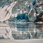 The Mendenhall Glacier with freshly calved blue ice touching fresh water. (Courtesy Photo / Kenneth Gill, gillfoto)