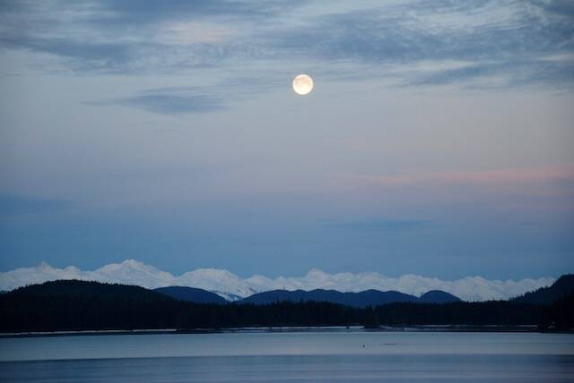A Wolf Moon shines bright over Fritz Cove on the morning of January 18, 2022. (Courtesy Photo / Bill Andrews)
