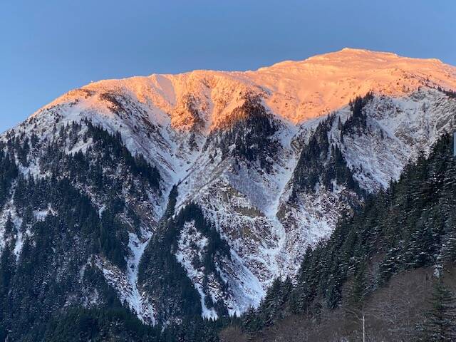 Alpenglow on Mount Juneau seen on Dec. 16. (Courtesy Photo / Denise Carroll)