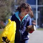 Ben Hohenstatt / Juneau Empire
Gerald Thill, 7, inspects a weathered can before placing it in a litter bag on Saturday during the citywide cleanup.