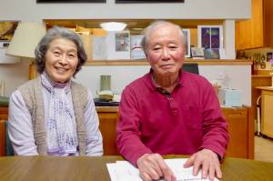 Emiko and Syun-Ichi Akasofu serve tea to guests at their home in Fairbanks in December 2021. (Courtesy Photo / Ned Rozell)