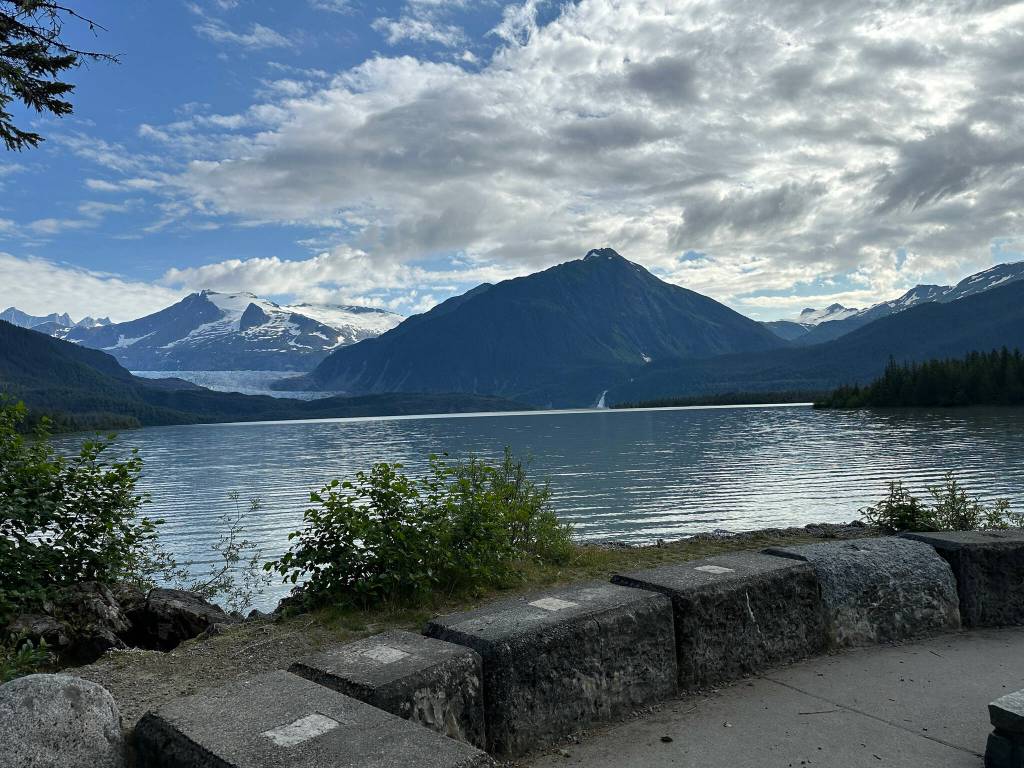 Examining the water level of the lake at Skaters Cabin on July 15. This is jökulhlaup season, when Suicide Basin releases water into the lake, causing flooding. The lake is high, but not jökulhlaup level. (Photo by Deana Barajas)