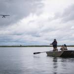 Michael Regan, administrator of the Environmental Protection Agency, fishes from a skiff on Sept. 28 during a visit to the Bristol Bay village of Igiugig. (Photo provided by Environmental Protection Agency)