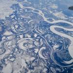 The Yukon River, seen here as a wide white band, is freezing later in fall and breaking up earlier in spring than it was a few decades ago. (Photo by Ned Rozell)