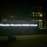 A sign at Thunder Mountain Middle School was changed in January 2025 from Thunder Mountain High School to reflect the Juneau School District consolidation that officially took effect July 1, 2024. ( Jasz Garrett / Juneau Empire)