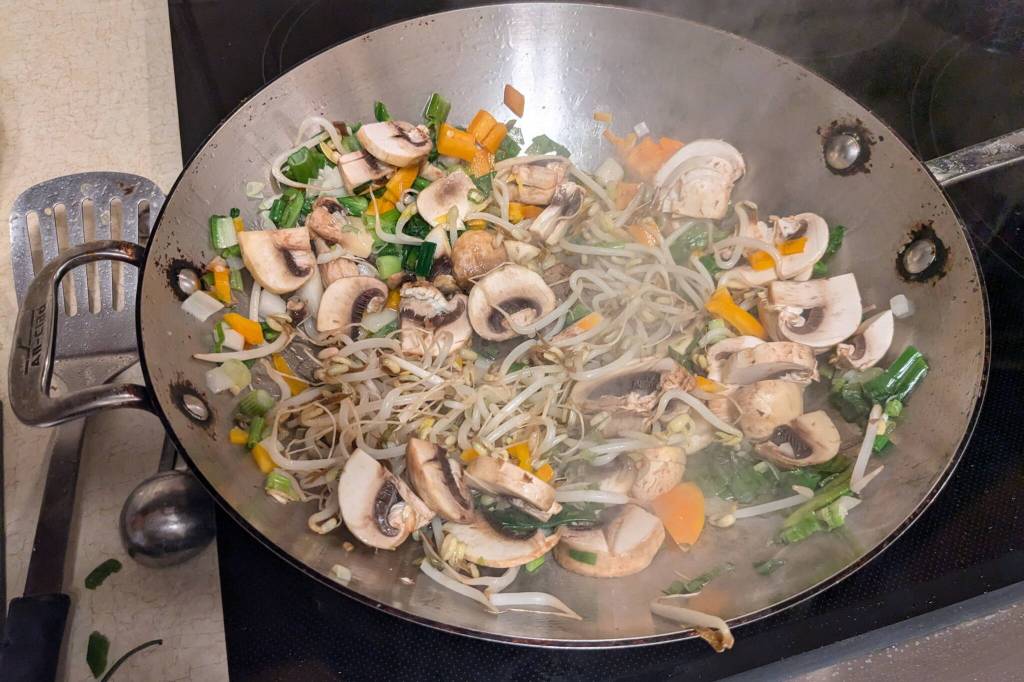 Stir-frying vegetables for Chinese-style fried rice. (Photo by Patty Schied)