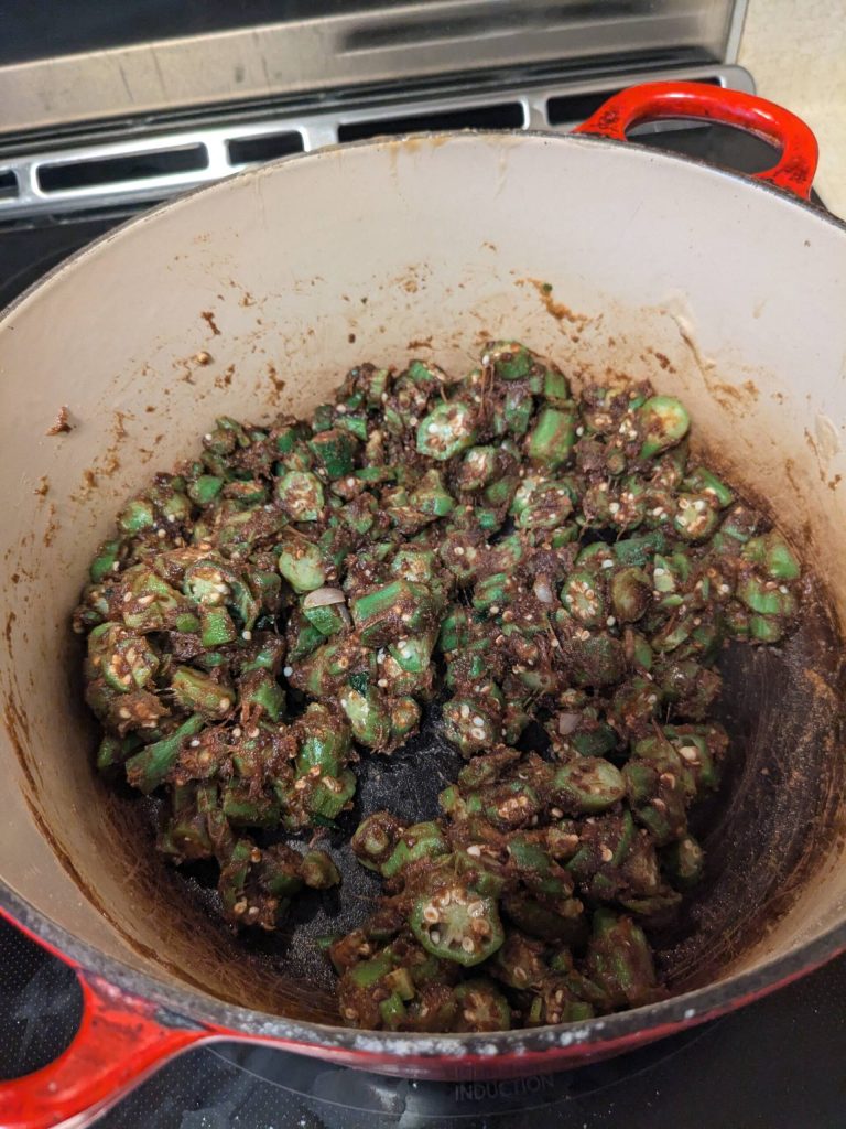 Adding orka to roux for shrimp gumbo. (Photo by Patty Schied)