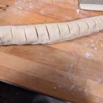 Cinnamon roll dough sliced for baking. (Photo by Patty Schied)