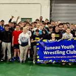 The Juneau Youth Wrestling Club pose at the Alaska USA Wrestling 2025 Folkstyle, Greco-Roman & Freestyle State Championships on May 1-3 at the Curtis D. Menard Memorial Sports Center in Wasilla. (Photo courtesy JYWC)