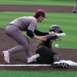 Juneau-Douglas High School: Yadaa.at Kalé junior Brandon Casperson slides and knocks the ball away from Ketchikan third baseman Owen Mendoza during the Crimson Bears baseball senior night against Ketchikan Saturday at Adair-Kennedy Memorial Park. (Klas Stolpe / Juneau Empire)