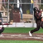 Juneau-Douglas High School: Yadaa.at Kalé senior JJ McCormick connects on a pitch during the Crimson Bears baseball senior night against Ketchikan Saturday at Adair-Kennedy Memorial Park. (Klas Stolpe / Juneau Empire)