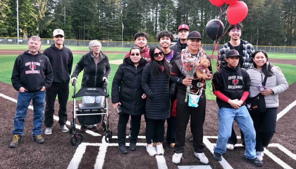 Juneau-Douglas High School: Yadaa.at Kalé senior JJ McCormick and family and friends are honored during the Crimson Bears’ baseball senior night against Ketchikan on Saturday at Adair-Kennedy Memorial Park. (Klas Stolpe / Juneau Empire)