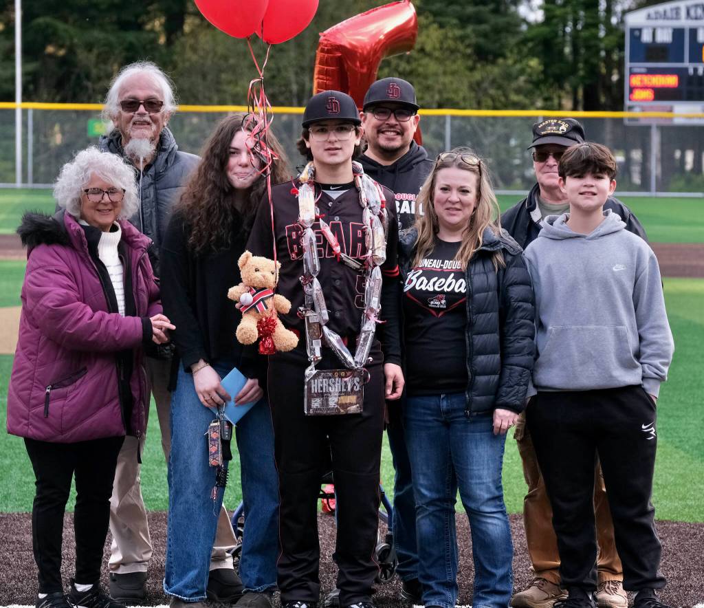 Juneau-Douglas High School: Yadaa.at Kalé senior Jacob Katasse and family and friends are honored during the Crimson Bears’ baseball senior night against Ketchikan on Saturday at Adair-Kennedy Memorial Park. (Klas Stolpe / Juneau Empire)
