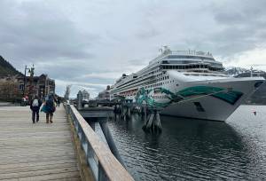 Visitors walk along the downtown cruise ship dock on Wednesday, May 14, 2025. (Mark Sabbatini / Juneau Empire file photo)