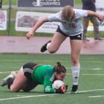 Juneau-Douglas High School: Yadaa.at Kalé junior keeper Alba Muir stops a Wasilla attack during Saturdays Crimson Bears senior appreciation game at Adair-Kennedy Memorial Park. (Klas Stolpe / Juneau Empire)