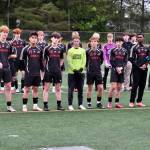 Juneau-Douglas High School: Yadaa.at Kalé boys head soccer coach Gary Lehnhart speaks about his senior players as they look on during Saturdays Crimson Bears senior appreciation game at Adair-Kennedy Memorial Park. (Klas Stolpe / Juneau Empire)