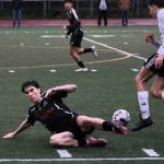 Juneau-Douglas High School: Yadaa.at Kalé senior tackles a ball away from a Wasilla player during Saturdays Crimson Bears senior appreciation game at Adair-Kennedy Memorial Park. (Klas Stolpe / Juneau Empire)