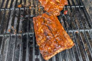 Barbecued baby back ribs finishing up on the grill. (Photo by Patty Schied)