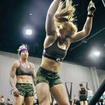 Chrish Newell, right, and partner Jess Contreras, left, at the Ski erg station during the HYROX 2025 Atlanta Doubles in late April. They qualified for the World Championships scheduled Sunday, June 15, 2025, in Chicago. (Photo courtesy Chrish Newell)
