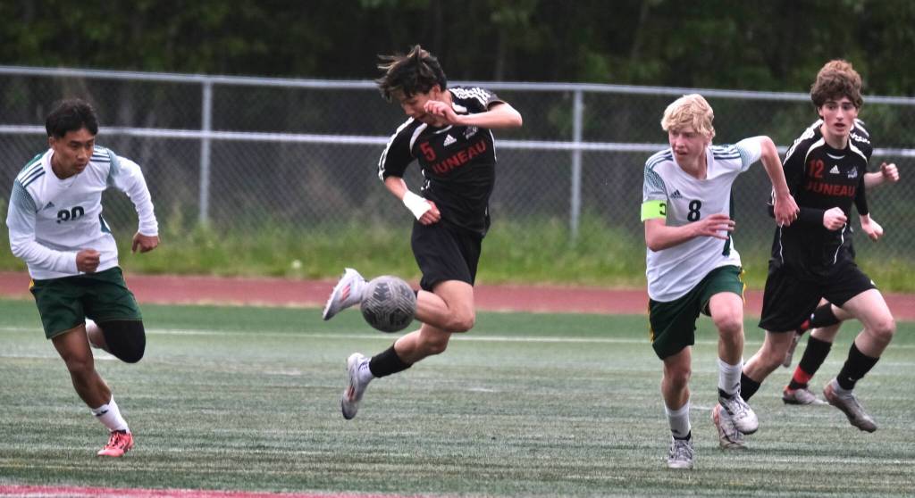 Juneau-Douglas High School: Yadaa.at Kalé freshman Troy Edgar controls a ball in the Crimson Bears win over Service to open the 2025 ASAA/First National Bank Alaska Soccer State Championships at Wasilla High School on Thursday, May 29, 2025. (Klas Stolpe / Juneau Empire)