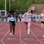 Juneau-Douglas High School: Yadaa.at Kalé freshman Bella Connally wins the Division I 100-meter dash during the 2025 ASAA/First Bank Alaska State Track & Field Championships on Saturday at Anchorages Dimond High School. To Connallys right are second-place finisher Jihsana Williams of Chugiak, a sophomore, and third-place finisher Anna Green of South Anchorage, a junior. (Klas Stolpe / Juneau Empire)