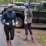 Three Marmoteers runner Christy Gentemann takes a hand off from Becky Bohrer at Lena Beach Picnic Area during the Seacoast Relay on Sunday, June 8, 2025. (Klas Stolpe / Juneau Empire)