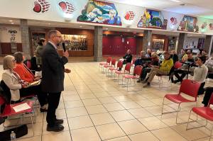 Juneau state Rep. Andi Story (left) and state Sen. Jesse Kiehl (standing) participate in a legislative town hall at Juneau-Douglas High School: Yadaa.at Kalé on Monday, June 9, 2025. Both are among the six legislators named to an education task force on Wednesday. (Mark Sabbatini / Juneau Empire)