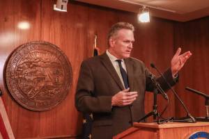 Gov. Mike Dunleavy speaks about his decision to veto House Bill 57 during a press conference at the Alaska State Capitol on Monday, May 19, 2025. (Jasz Garrett / Juneau Empire file photo)