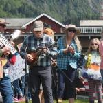A group introduced as a bunch of concerned musicians play music at the No Kings protest on Saturday, June 14, 2025. (Natalie Buttner / Juneau Empire)