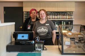 Jasz Garrett / Juneau Empire
Sacred Ground baristas Raven Salduvar and Mackenzie Gray serve coffee in their new location, Aan Hít, on Sunday, June 22, 2025.