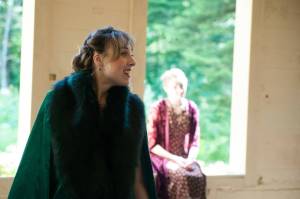 Natalia Spengler performs as Beatrice during a tech rehearsal of Much Ado About Nothing. Anna Becknell as Hero sits in the window behind her. (Courtesy of Flordelino Lagundino)