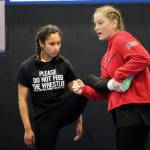 2024 Olympic wrestling gold medalist Amit Elor, 21, demonstrates a counter move on Delta Junction High School freshman Clarissa Perez, 14, during the Juneau Girls Wrestling Clinic on Wednesday at the Juneau Wrestling Center. (Klas Stolpe / Juneau Empire)