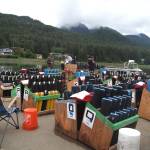 Volunteers work on the barge deck where fireworks are being staged on Thursday<ins>, July 3, 2025</ins>. (Natalie Buttner / Juneau Empire)